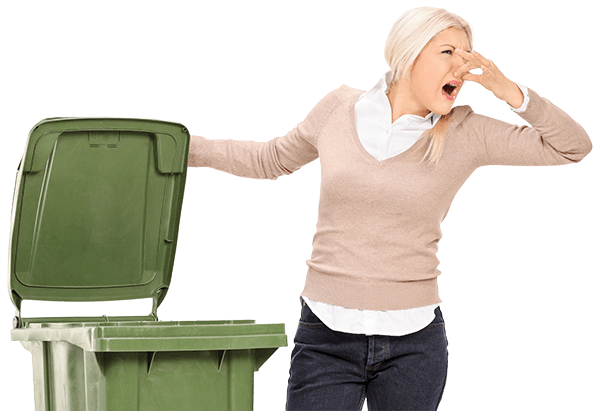 Woman smelling trash garbage bin cleaning