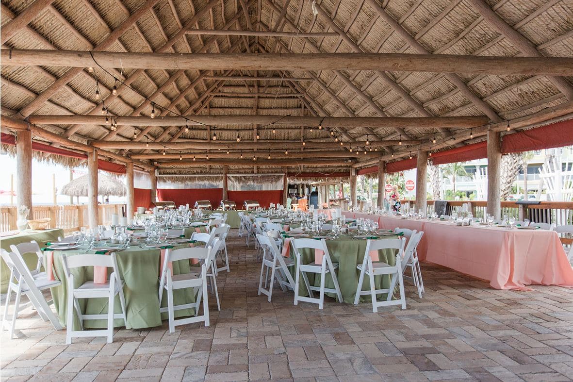 Tiki hut with tables for wedding