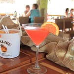 orange drink on bar
