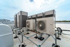 Row of HVAC system units on a building rooftop in Palmetto, Florida.