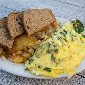 omlette and toast with hashbrowns